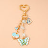 Enamel Flower & Butterfly Heart Keychain – Cute Love Key Ring Handbag Charm Pendant for Women & Girls