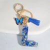 Blue Glazed Stone A to Z Initial Keychain with Butterfly Tassel – 55mm (2.17 in) Resin Alphabet Charm for Women, Car & Bag