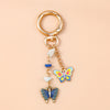 Enamel Flower & Butterfly Heart Keychain – Cute Love Key Ring Handbag Charm Pendant for Women & Girls