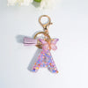 Sequin Letter Keychain with Tassel & Butterfly Charm – Initial A-Z Resin Keyring for Women, Bag & Car (55mm / 2.2 in)