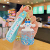 Quicksand Bottle Silicone Keychain – Cute Cat & Cinnamon Roll Bag Charm with Gold Accent