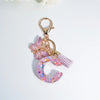 Sequin Letter Keychain with Tassel & Butterfly Charm – Initial A-Z Resin Keyring for Women, Bag & Car (55mm / 2.2 in)