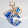 Blue Glazed Stone A to Z Initial Keychain with Butterfly Tassel – 55mm (2.17 in) Resin Alphabet Charm for Women, Car & Bag