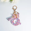 Sequin Letter Keychain with Tassel & Butterfly Charm – Initial A-Z Resin Keyring for Women, Bag & Car (55mm / 2.2 in)