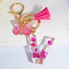 Pink Dried Flower Resin Initial Keychain with Butterfly Tassel A-Z Letter Keyring for Women Valentine's Gift