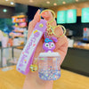 Quicksand Bottle Silicone Keychain – Cute Cat & Cinnamon Roll Bag Charm with Gold Accent