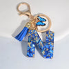 Blue Glazed Stone A to Z Initial Keychain with Butterfly Tassel – 55mm (2.17 in) Resin Alphabet Charm for Women, Car & Bag
