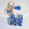 Blue Glazed Stone A to Z Initial Keychain with Butterfly Tassel – 55mm (2.17 in) Resin Alphabet Charm for Women, Car & Bag