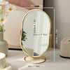 Elegant Iron-Framed 360° Rotating Makeup Mirror — HD Vanity Mirror for Bedroom & Dressing Table